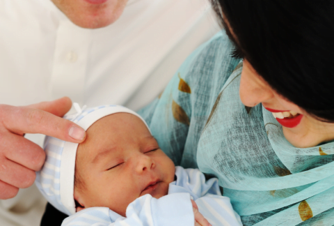 Parents connecting with new baby
