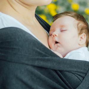 baby sleeping in the sling